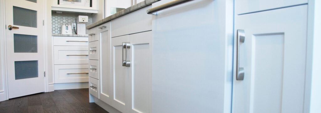 Lower white cabinets in a Sarnia home by Sarnia Cabinets.