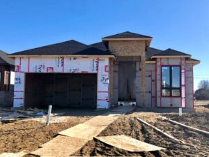 Iacobelli Construction home under construction. Features Sarnia Cabinets cabinetry in kitchen and bathrooms.