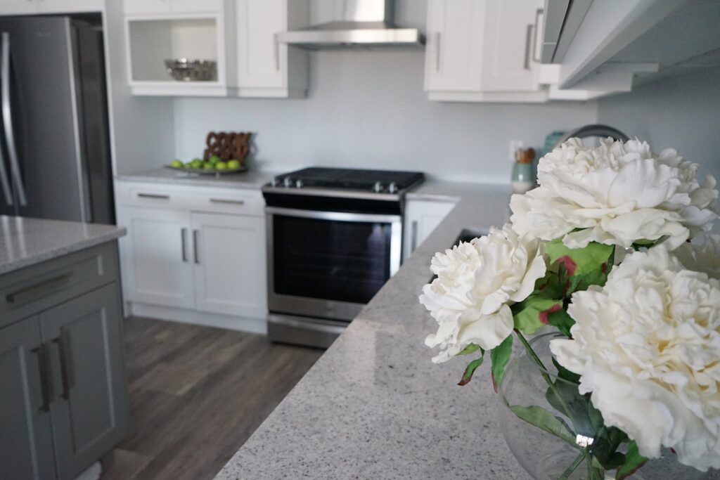 Iacobelli Construction Homes Kitchen with white cabinets. Sarnia Cabinets design, supply and installation