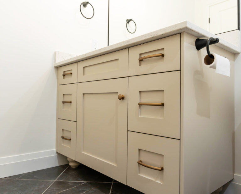Grey and gold bathroom vanity by Sarnia Cabinets