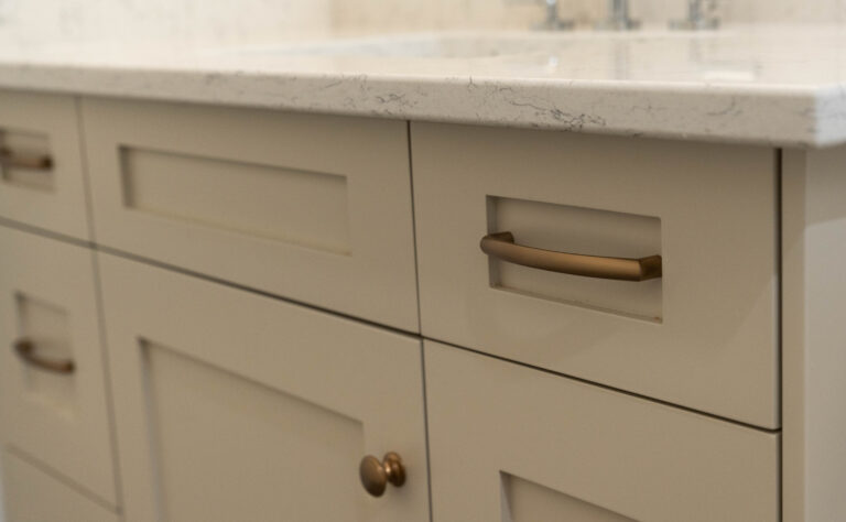 Sarnia Cabinets Bathroom Renovation with Grey Cabinets and Gold (brushed) knobs and handles